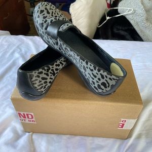 Dansko animal print flats.